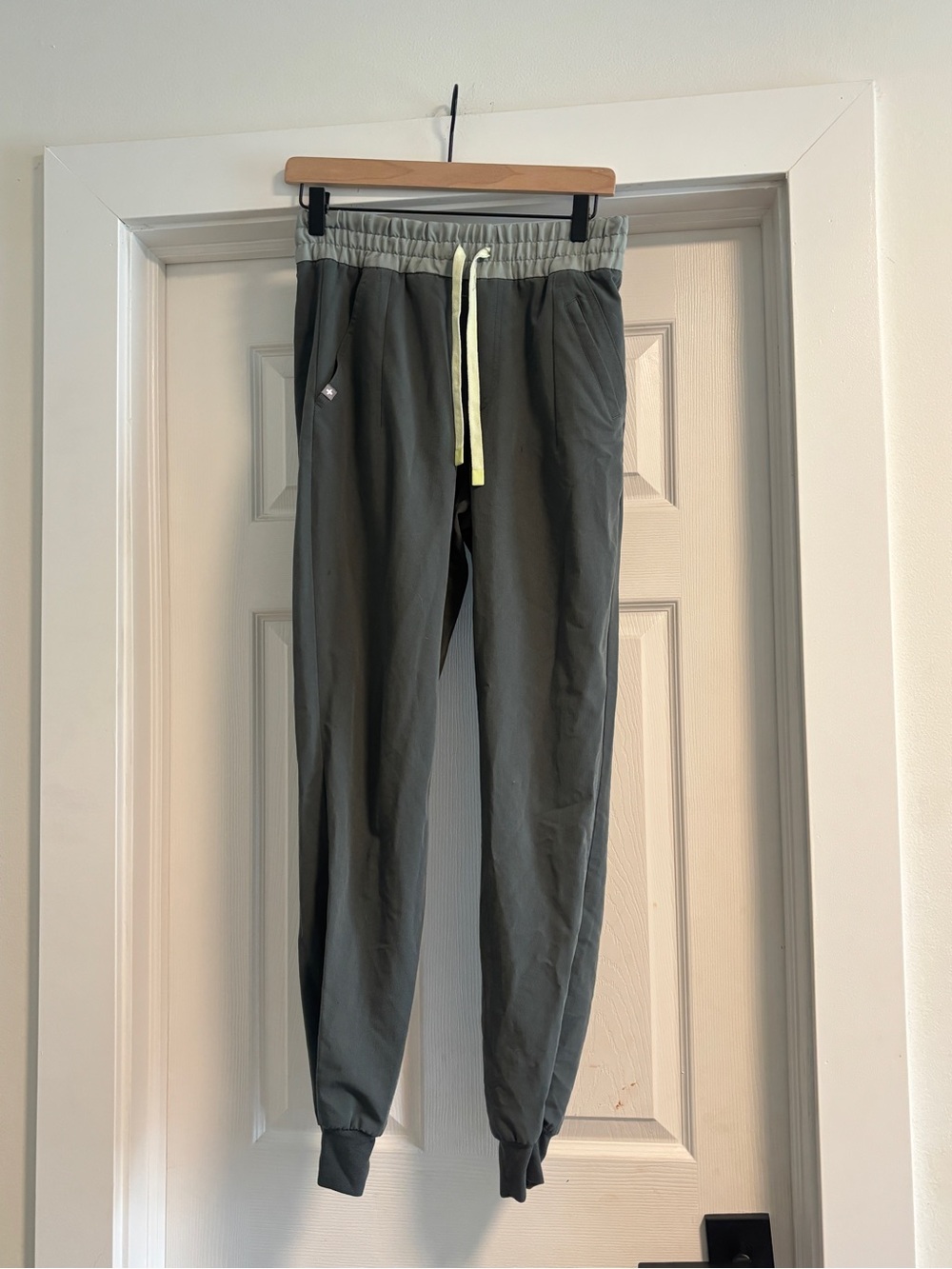 Figs Olive Green Jogger Pants with Light Gray Waistband and Yellow Drawstring
